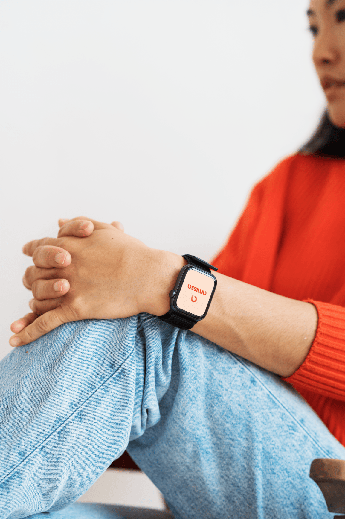 Woman wearing Apple Watch with Amissa logo